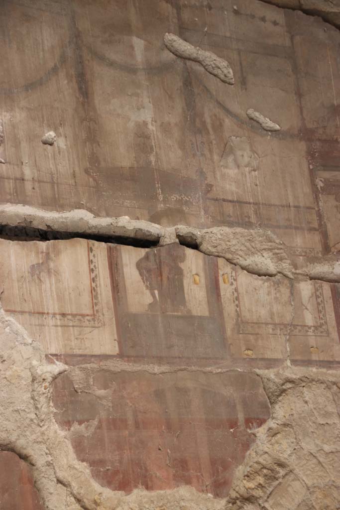 IV.4 Herculaneum. September 2017. Room 19, detail from upper centre of south wall of biclinium.
Photo courtesy of Klaus Heese.
