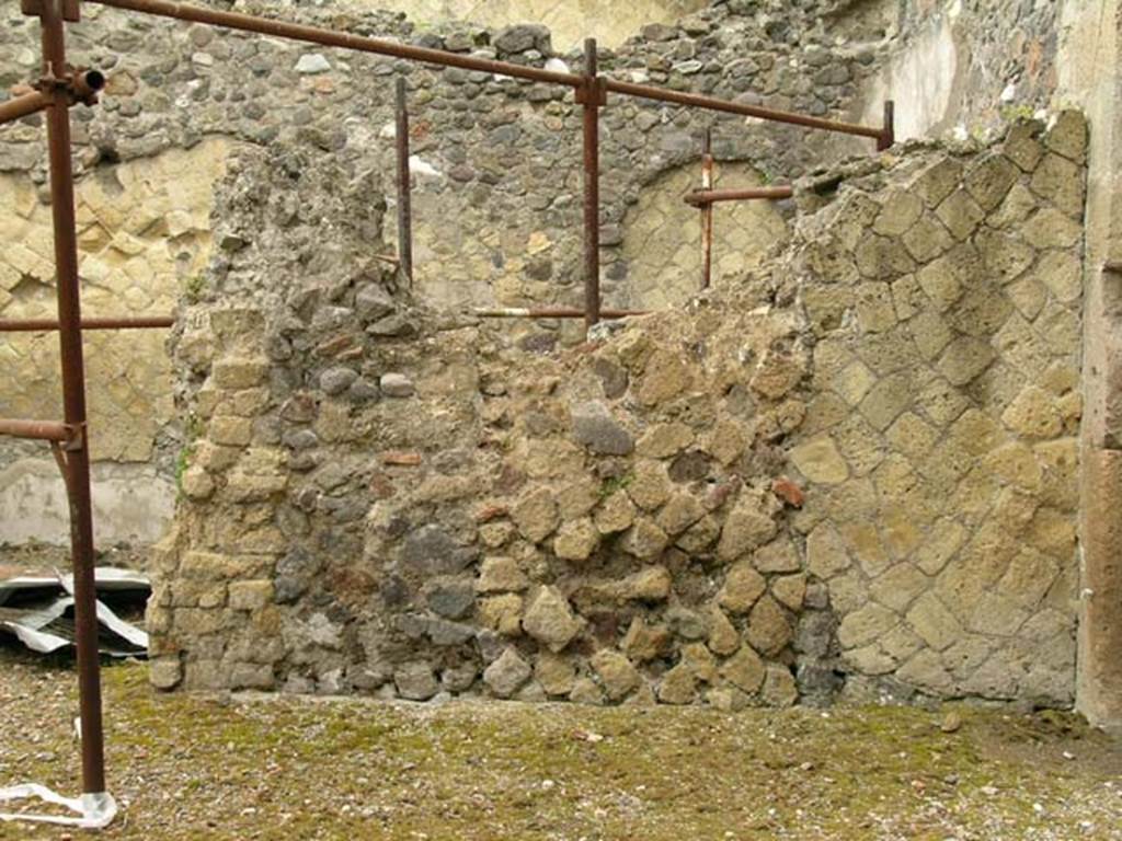 IV.6, Herculaneum, May 2005. Room 8, north wall of atrium in north-east corner, with doorway to room 9, on left.  The doorway to room 10 is on the right. Photo courtesy of Nicolas Monteix.
