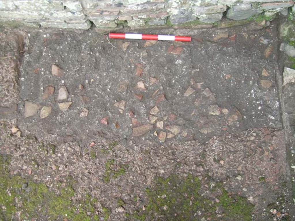 IV.6, Herculaneum, May 2005. Room 10, drain/gutter against east wall. Photo courtesy of Nicolas Monteix.