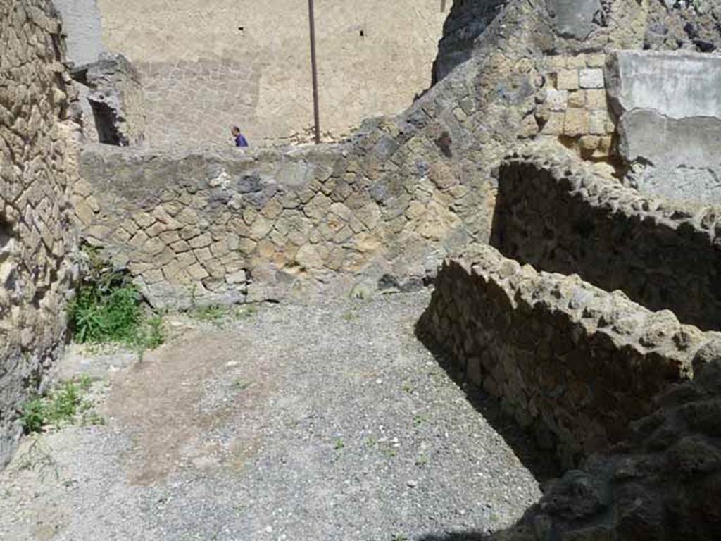 Ins. IV.8, Herculaneum, May 2010. Looking towards north-east corner, and wall of small room/area.