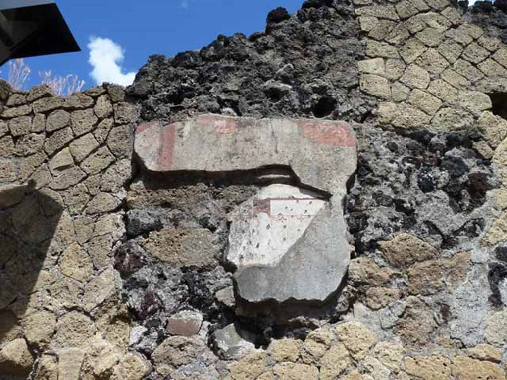 Ins. IV.9, Herculaneum, May 2010. Painted plaster from side of stairs to upper floor, on north wall near entrance doorway. 