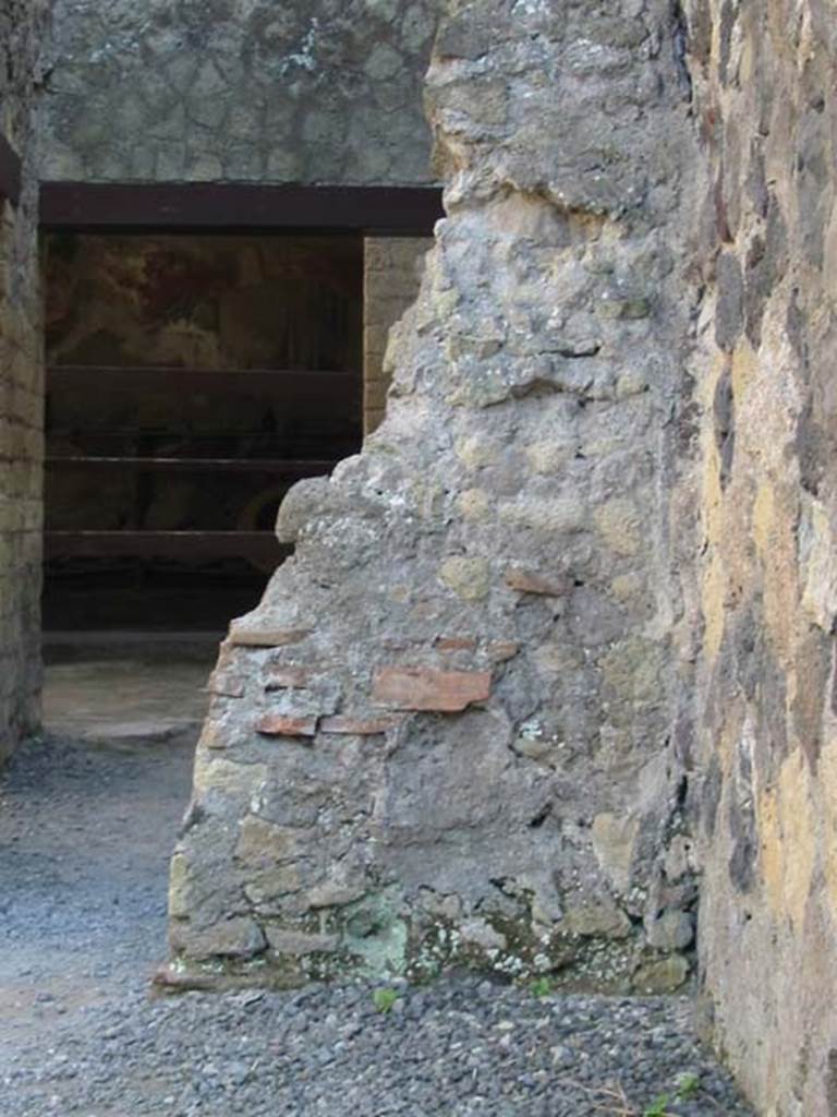 V.10/11, Herculaneum, May 2003.  
Looking east towards remains of wall, in south-east corner of large room, probably part of IV.11.
Photo courtesy of Nicolas Monteix.

