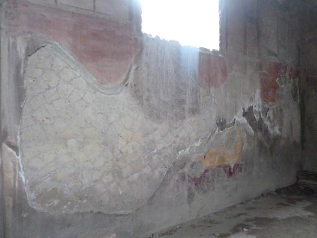 IV.11, Herculaneum, September 2015. North wall of triclinium with window into corridor on north side. 