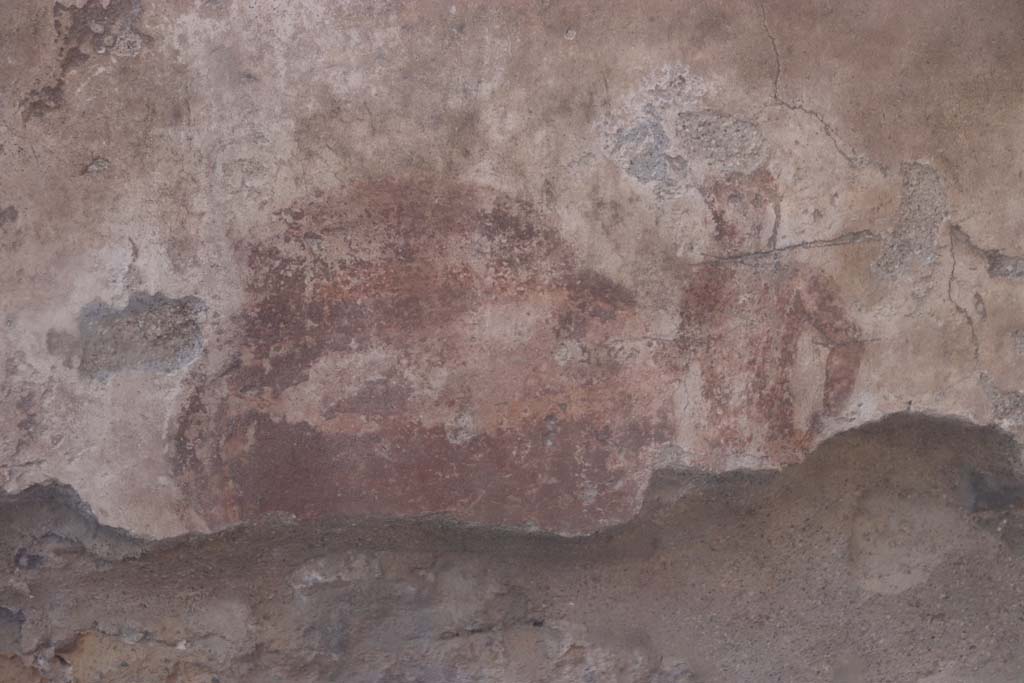 IV.17, Herculaneum, September 2019. 
Looking towards a different figure still visible on the south wall behind the sales counter. Photo courtesy of Klaus Heese.
