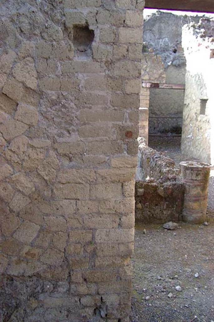 IV.18, Herculaneum, July 2001. Room 9, south end of doorway in west wall, leading into atrium, room 11. 
Photo courtesy of Nicolas Monteix.
