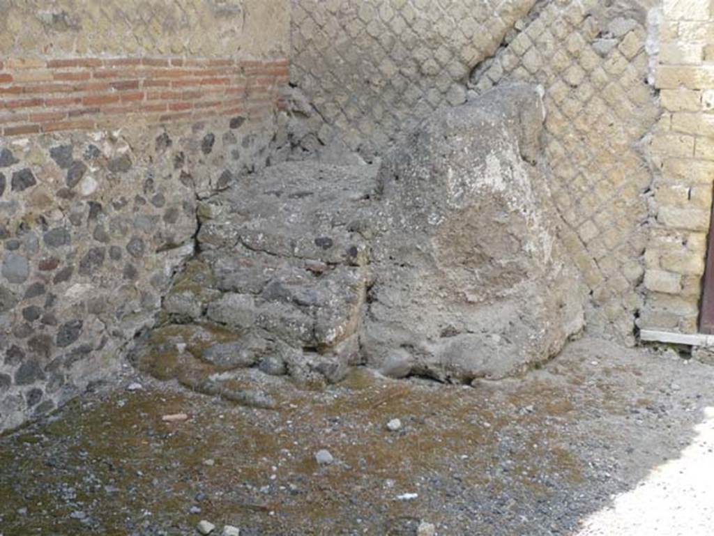 IV.19 Herculaneum. August 2013. Stone steps in south-west corner, leading to a mezzanine room. Photo courtesy of Buzz Ferebee.
