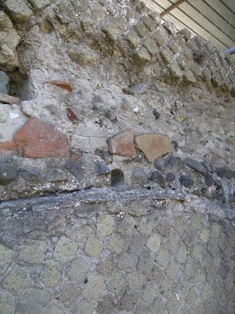 IV.19, Herculaneum, May 2005. Room 5, detail from south wall.
Photo courtesy of Nicolas Monteix.
