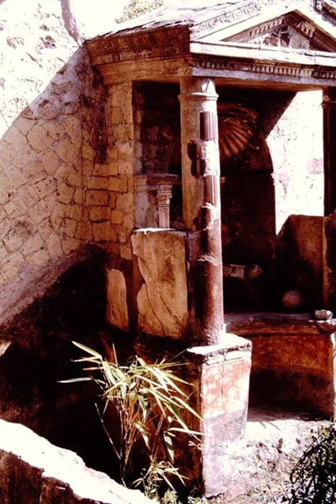 V.5 Herculaneum. 1964. Garden room 9. Aedicula shrine against east wall of garden. Photo by Stanley A. Jashemski.
Source: The Wilhelmina and Stanley A. Jashemski archive in the University of Maryland Library, Special Collections (See collection page) and made available under the Creative Commons Attribution-Non-Commercial License v.4. See Licence and use details.
J64f1173

