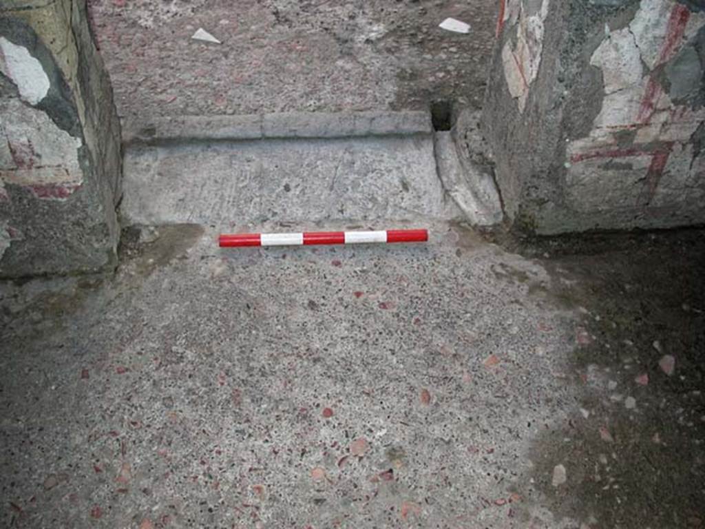 V.7, Herculaneum. September 2003. Doorway and threshold to cubiculum in south-east corner of atrium. Photo courtesy of Nicolas Monteix.
