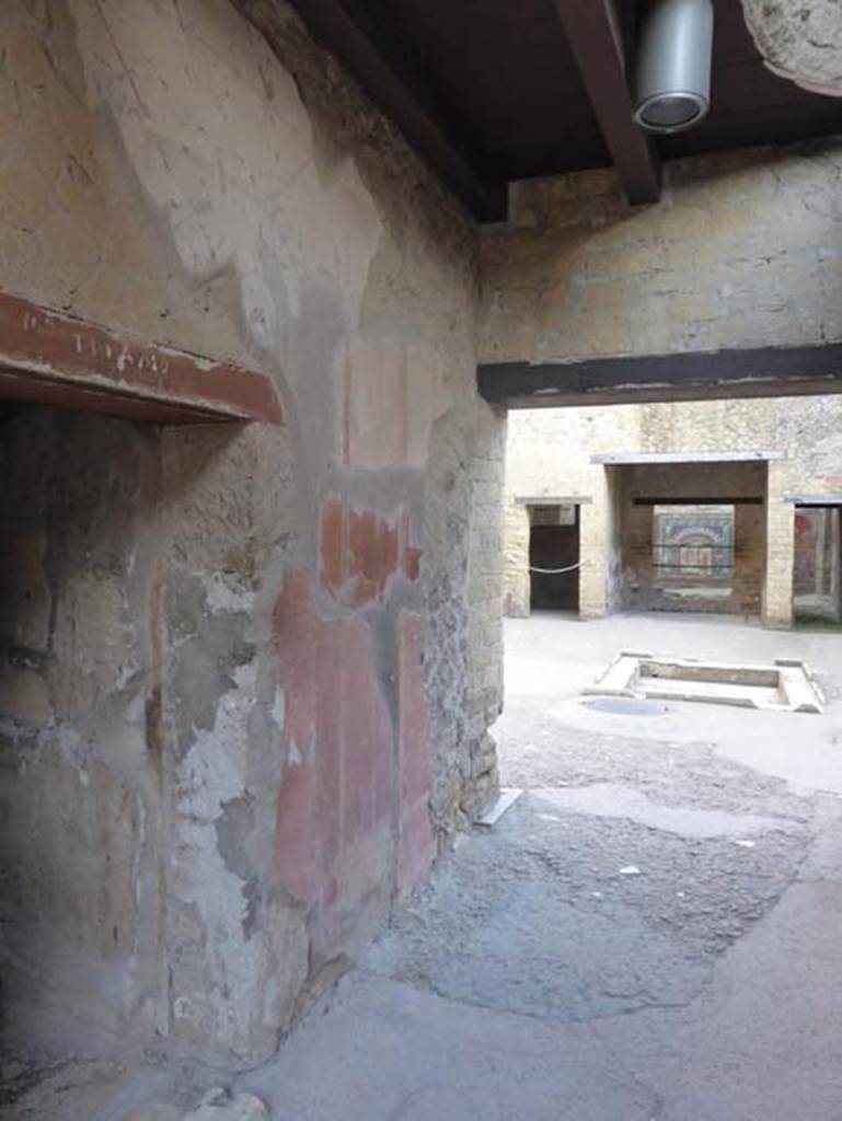 V.7 Herculaneum, October 2014. Looking east along north side of entrance corridor towards atrium. Photo courtesy of Michael Binns.
