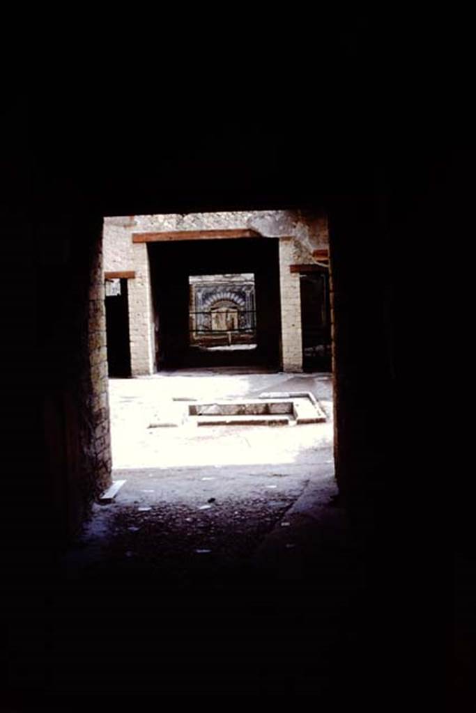 V.7 Herculaneum. 1955. Looking east from entrance doorway. 
Source: The Wilhelmina and Stanley A. Jashemski archive in the University of Maryland Library, Special Collections (See collection page) and made available under the Creative Commons Attribution-Non Commercial License v.4. See Licence and use details. J55f0476

