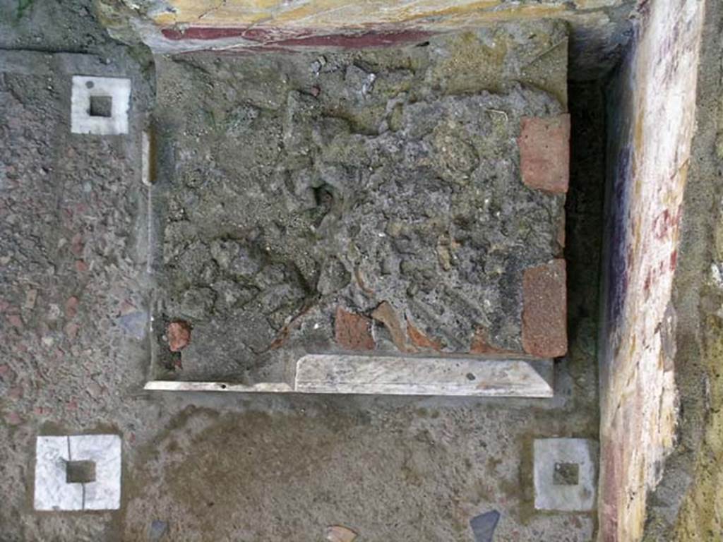 V.7, Herculaneum. May 2005. Looking down onto lararium in north-west corner of atrium. 
Photo courtesy of Nicolas Monteix.
