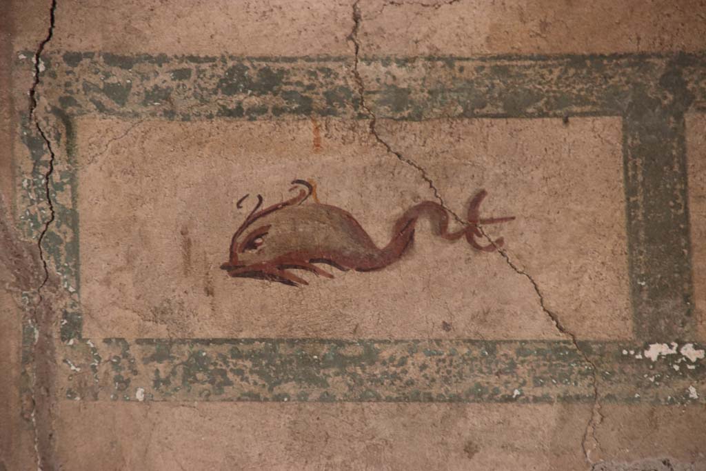 V.8 Herculaneum. September 2021. 
Room 1, detail of painted panel from east end of north wall in entrance hall. Photo courtesy of Klaus Heese.
