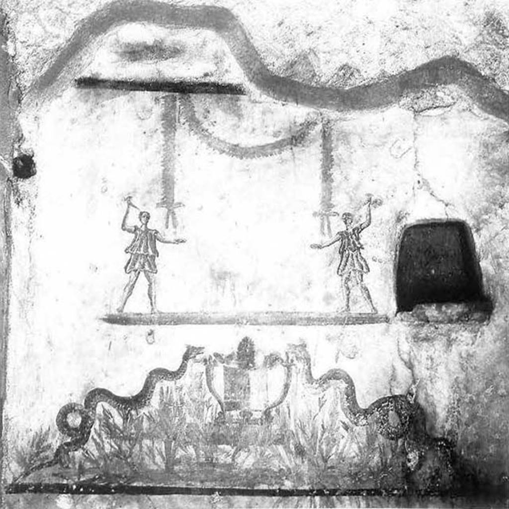 V.14, Herculaneum. Upper floor apartment above V.14/15. Lararium on rear wall between two cubicula.
White-ground wall surface, framed in red above and below, to the right of the picture is a niche.
In the upper part of the picture two Lares are either side of a round altar. 
At the upper edge is a painted garland, whose ends hang down in front of the heads of the Lares.
In the lower picture zone, two pyramidal ascending snakes flank a round altar, which stands on a separate ledge and is surrounded by green and brown bushes.
The altar has three animal feet and is framed by two cornucopias. 
On a second line at the lower edge of the picture are more green bushes.
See Fröhlich, T., 1991. Lararien und Fassadenbilder in den Vesuvstädten. Mainz: von Zabern, L116, Taf. 49,1.
