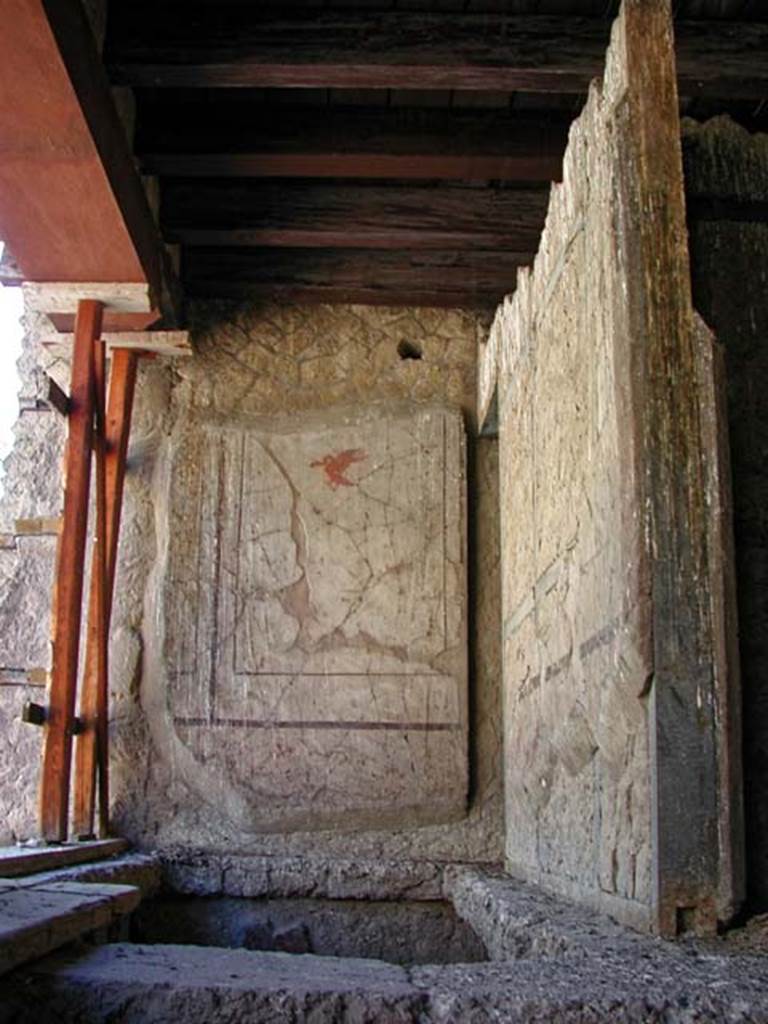 V.14/16, Herculaneum. September 2003. 
Upper floor above V.16, room 38, or corridor “a”, looking towards east wall.
The stairs would have come up into the corridor, centre right, and the doorway on the right would have led towards cubiculum E, or room 7. Photo courtesy of Nicolas Monteix.
