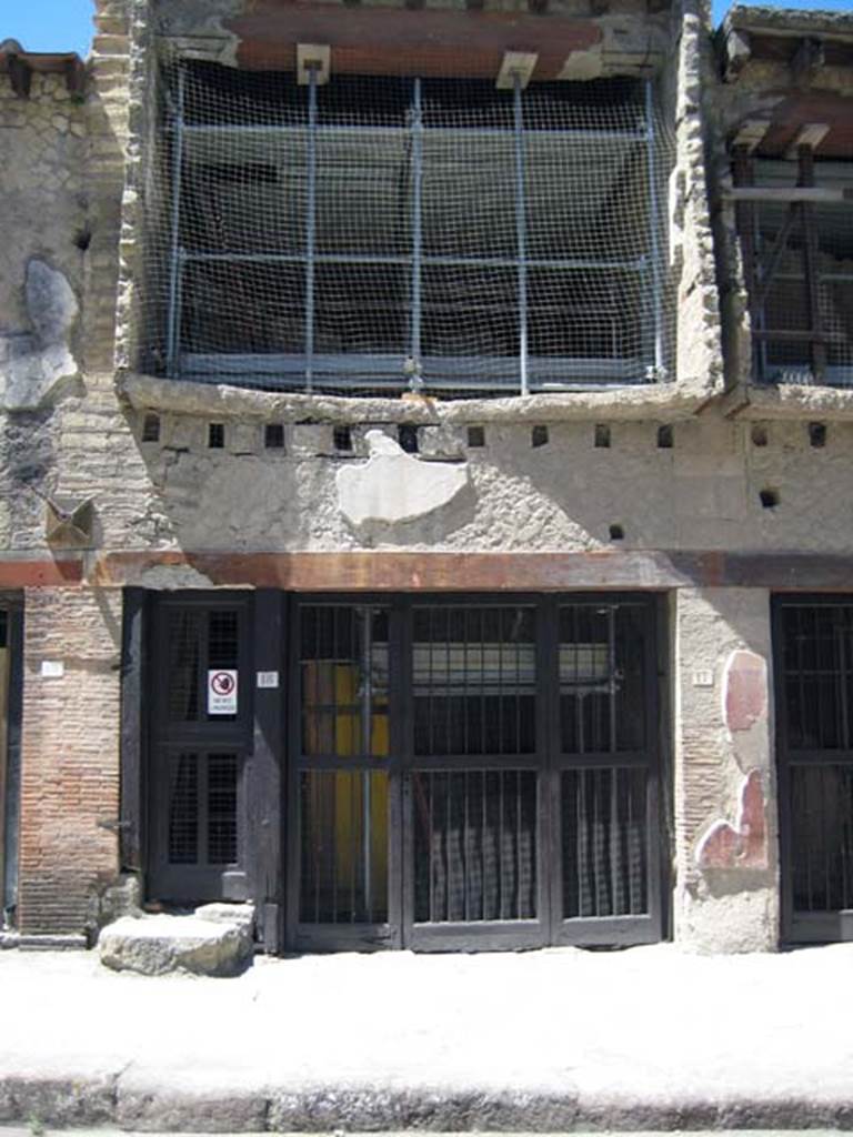 V 18, on left, and 17, Herculaneum, June 2011. Looking south towards entrance doorways and upper floor.
Photo courtesy of Sera Baker.
