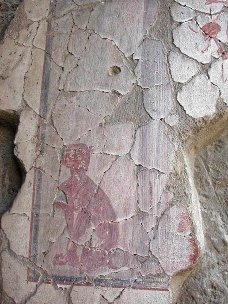 V.17/18, Herculaneum. September 2003. Painted figure on upper west wall towards street front. 
Photo courtesy of Nicolas Monteix.
