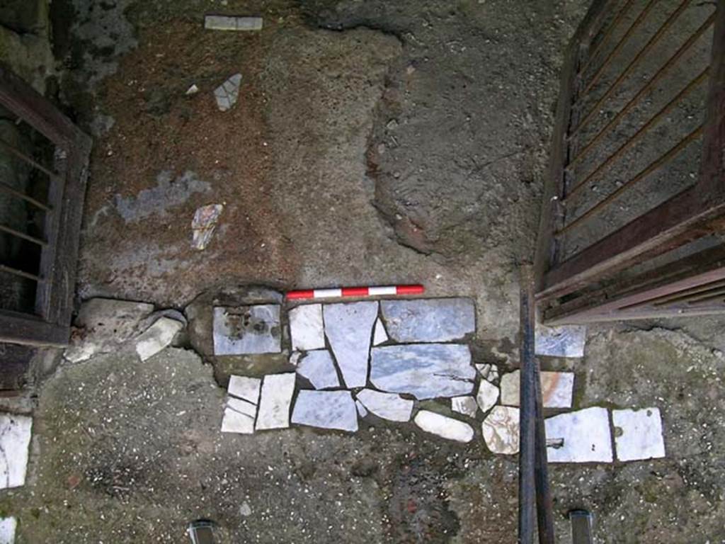 V.17/18, Herculaneum.  May 2004. Detail of doorway. Photo courtesy of Nicolas Monteix.