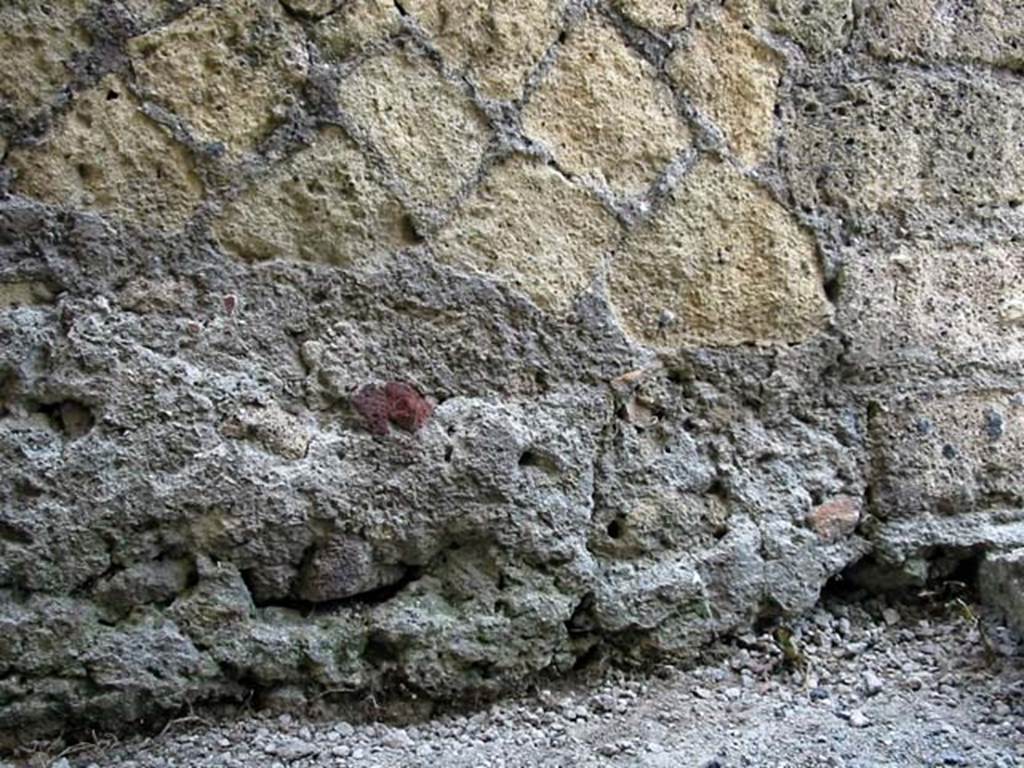 V.29, Herculaneum. May 2003. Detail of remaining part of north wall in entrance with steps to upper floor. Photo courtesy of Nicolas Monteix.
