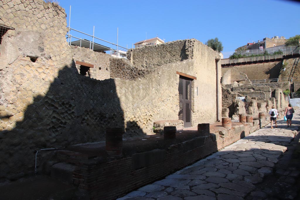 V.30 Herculaneum, October 2022. 
Looking north towards entrance doorway on west side of Cardo V. Superiore. Photo courtesy of Klaus Heese.
