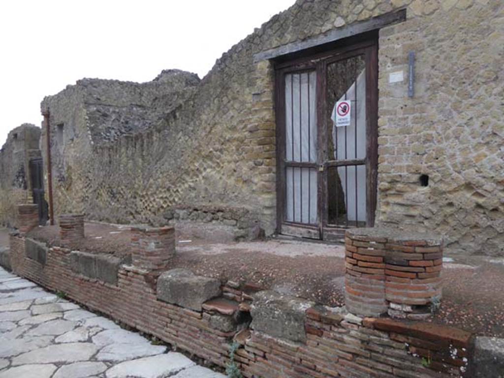 V.30 Herculaneum, October 2015. Looking towards entrance doorway on west side of Cardo V. Superiore. Photo courtesy of Michael Binns.
