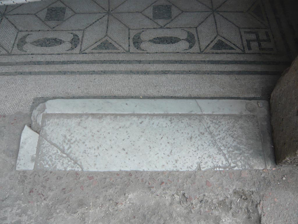 V.30 Herculaneum. August 2013. Doorway threshold or sill leading to oecus (1). Photo courtesy of Buzz Ferebee.