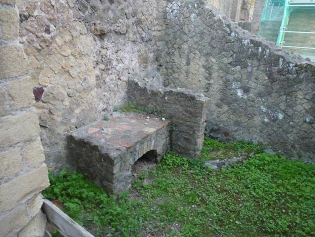 V.30, Herculaneum, October 2012. Looking across kitchen area 9 towards latrine. The steps to the upper floor were also In this room. Photo courtesy of Michael Binns.

