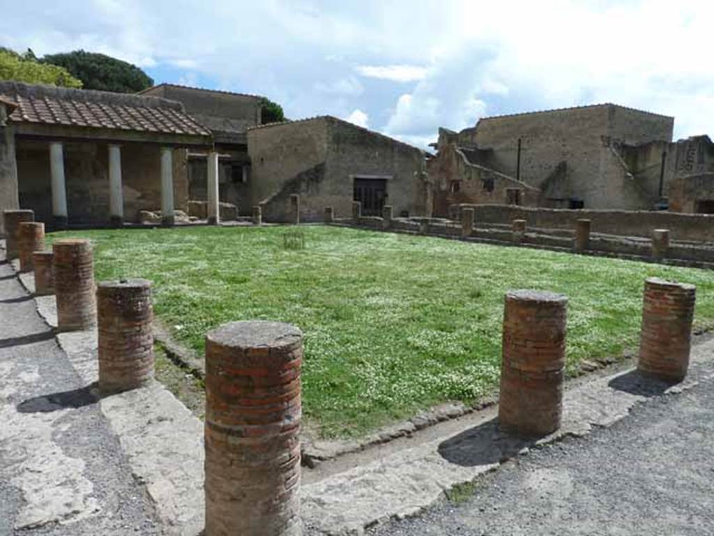 Ins. VI.1/7. May 2010. Looking south-east across palaestra from near entrance at Ins. VI.1.