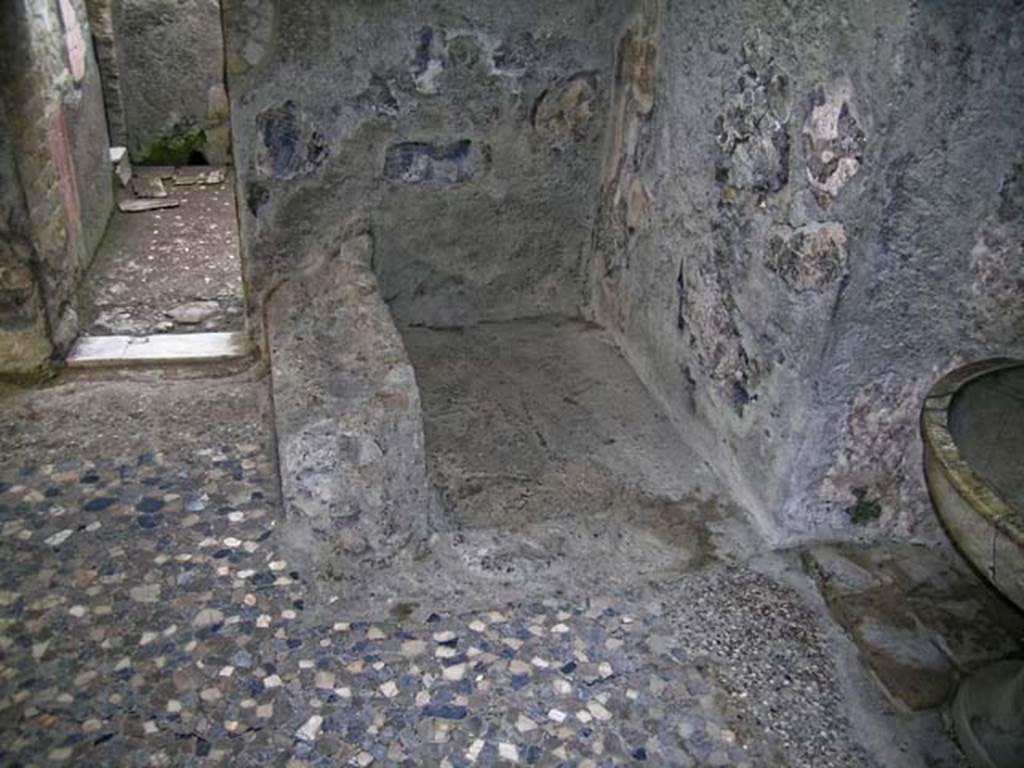 VI.1, Herculaneum. October 2004. Looking towards the north-west corner of apodyterium, with doorway to corridor to frigidarium, on left.
Photo courtesy of Nicolas Monteix.
