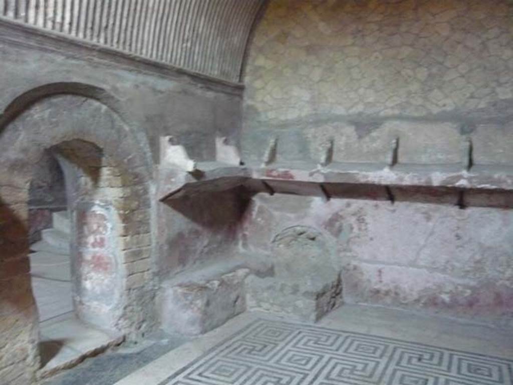 VI.8, Herculaneum. August 2013. Looking towards north-west corner of tepidarium, and doorway in west wall into hot room or caldarium. Photo courtesy of Buzz Ferebee.
