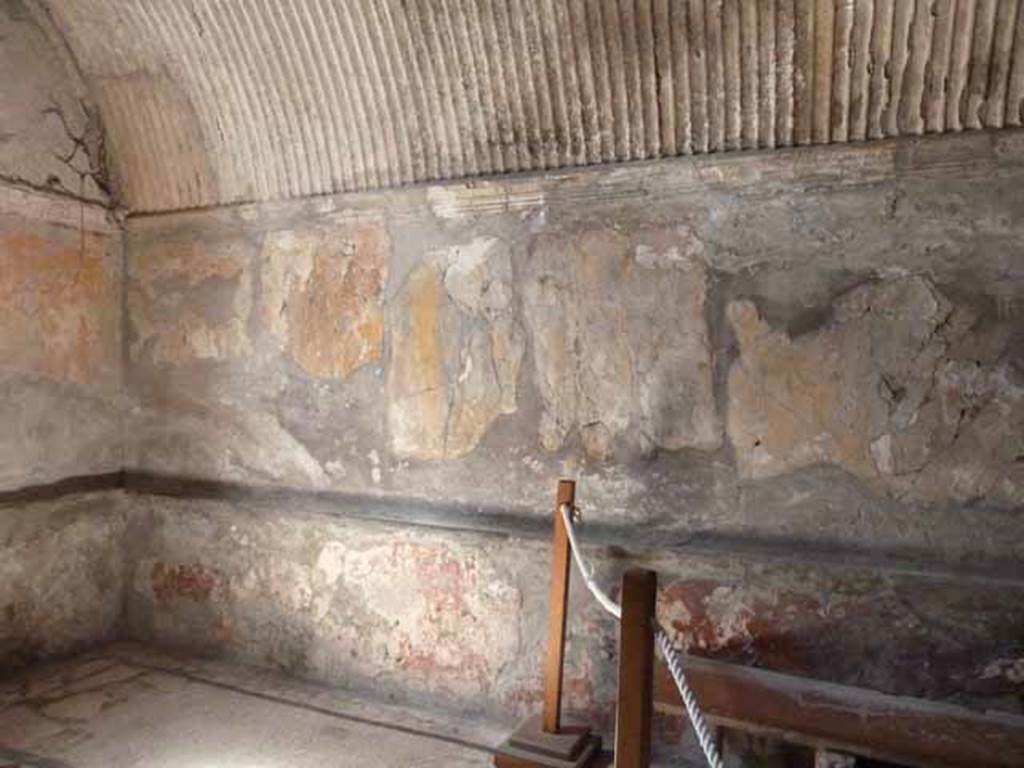 VI.8, Herculaneum. May 2010. North-east corner and east wall of hot-room. 