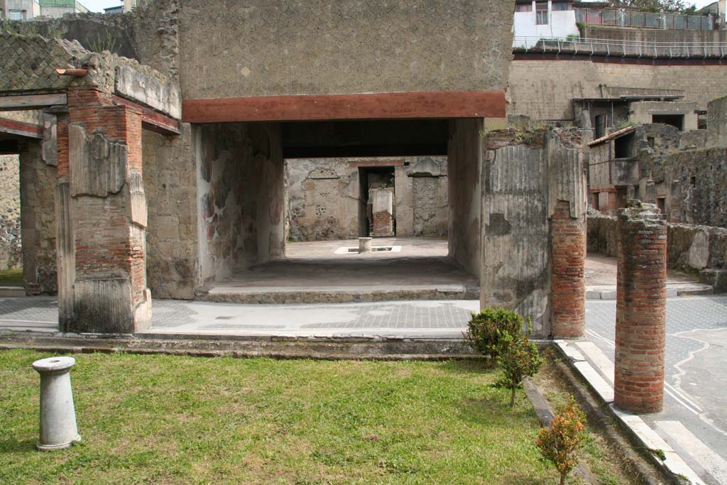 VI.13 Herculaneum, April 2013. Looking north from peristyle through tablinum to atrium, oecus 8 can be seen, on the right.
Photo courtesy of Klaus Heese. 
