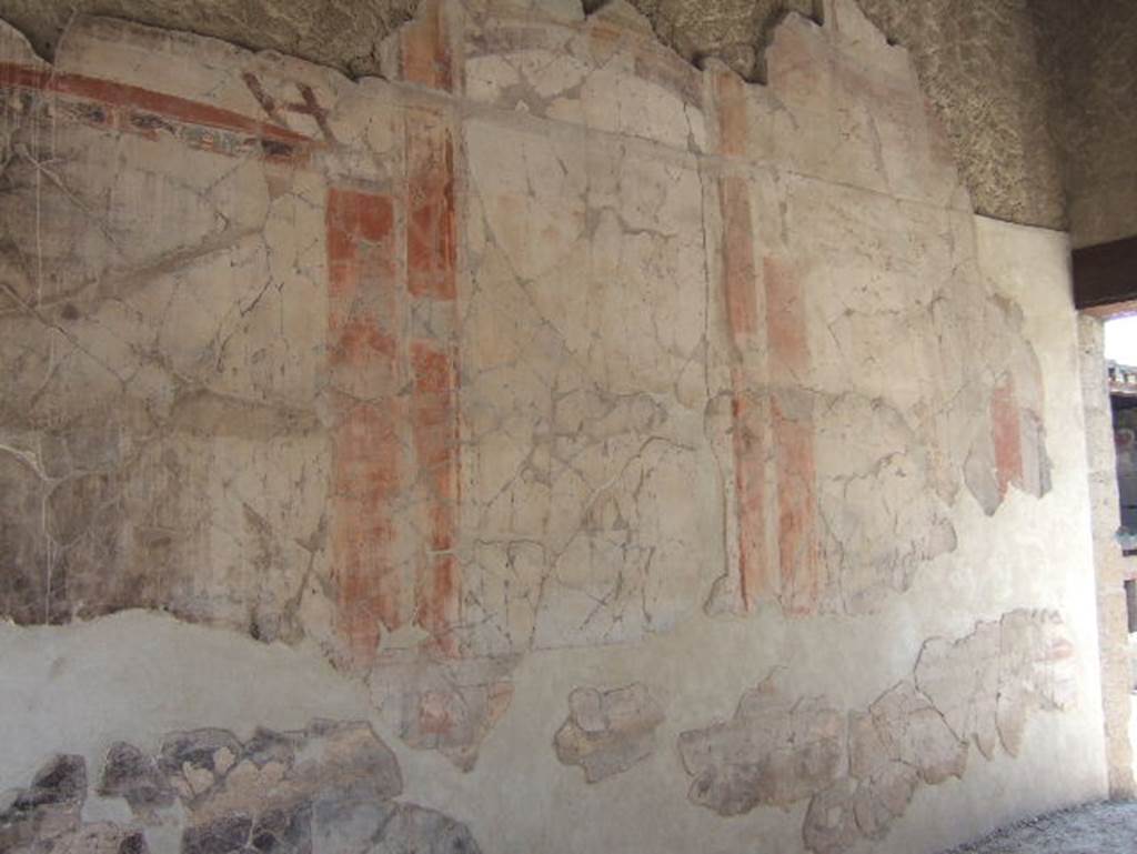 VI.13, Herculaneum, May 2006. Looking south along east wall of tablinum.