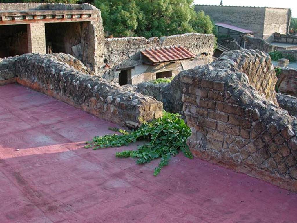 VI.13/11, Herculaneum. September 2003. 
Upper floor, looking south-east across rooms on south side of upper floor, towards Cardo IV roadway, in centre.
Photo courtesy of Nicolas Monteix.
