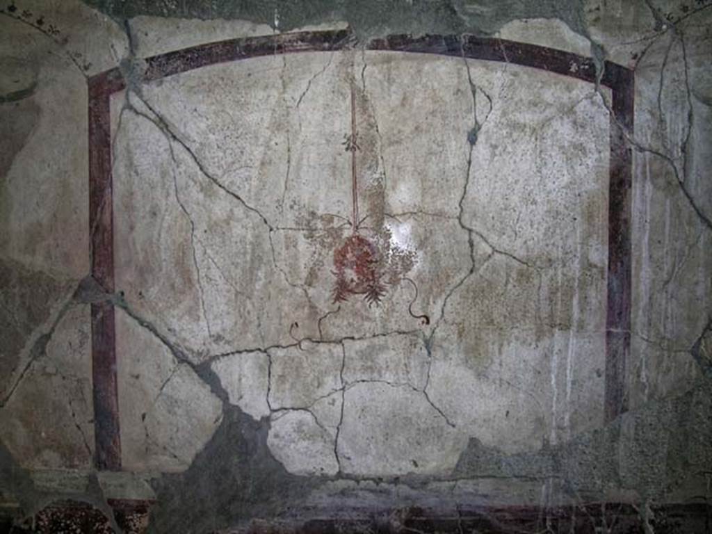 VI.13/11, Herculaneum. May 2004. Corridor between tablinum and oecus. Detail from east wall. 
Photo courtesy of Nicolas Monteix.
