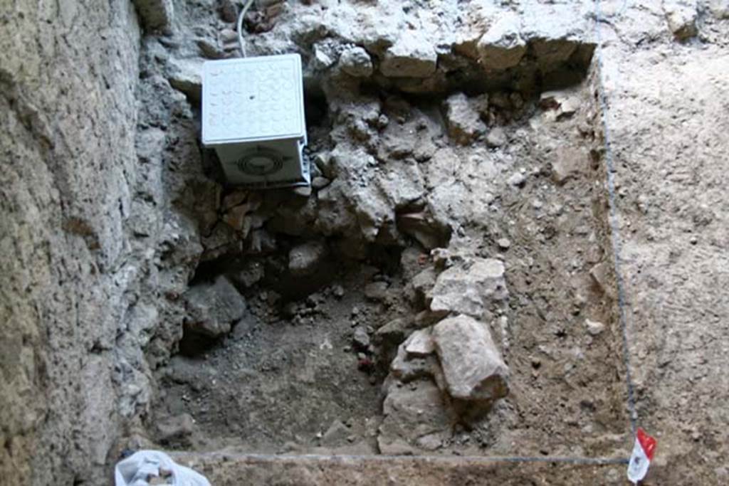 VI.14 Herculaneum. August 2005. Investigation in north-west corner of shop-room to a lower level. Photo courtesy of Nicolas Monteix.