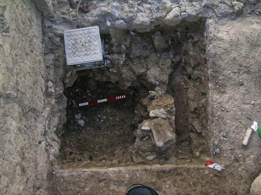 VI.14, Herculaneum. September 2005. Looking north in lower level of investigation in north-west corner of shop-room. 
Photo courtesy of Nicolas Monteix.


