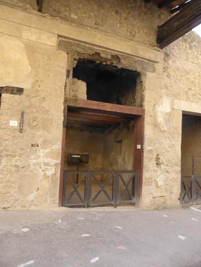 Ins. VI 15 Herculaneum, September 2015. Looking south from Decumano Massimo across pavement with marble inserts, to entrance doorway.