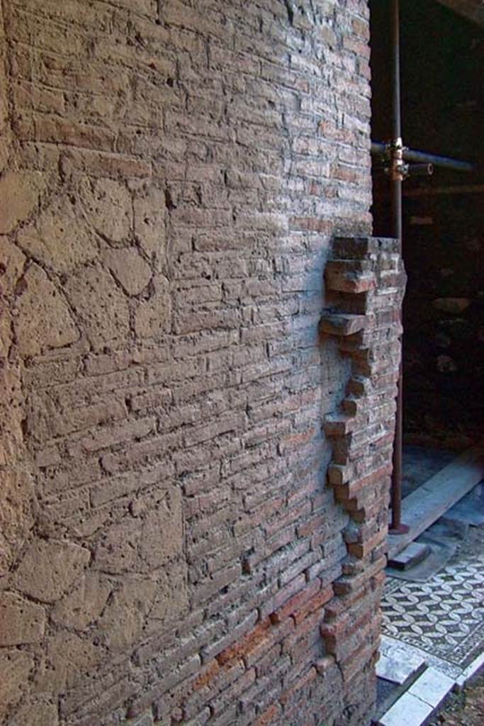 VI.17, Herculaneum. February 2003. West wall of corridor at north end, with room 7, oecus, on right. 
Photo courtesy of Nicolas Monteix.
