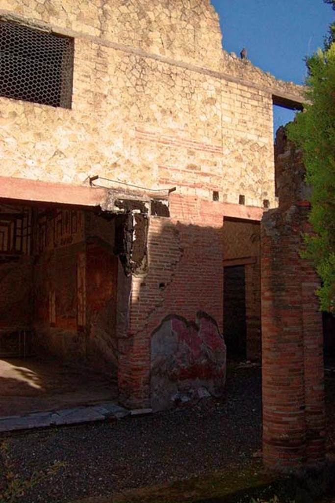 VI.17, Herculaneum. February 2003. 
Looking towards north-east corner of peristyle, with doorway to room 13, on left. 
Photo courtesy of Nicolas Monteix.
