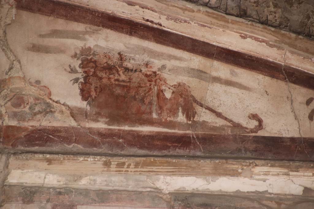 VI.17 Herculaneum. September 2019. Detail from upper north wall of triclinium, at east end. Photo courtesy of Klaus Heese.