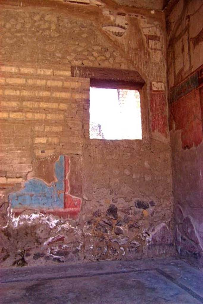 VI.17, Herculaneum. July 2003. 
South-west corner of tablinum, with partly blocked window in south wall at west end. 
Photo courtesy of Nicolas Monteix.
