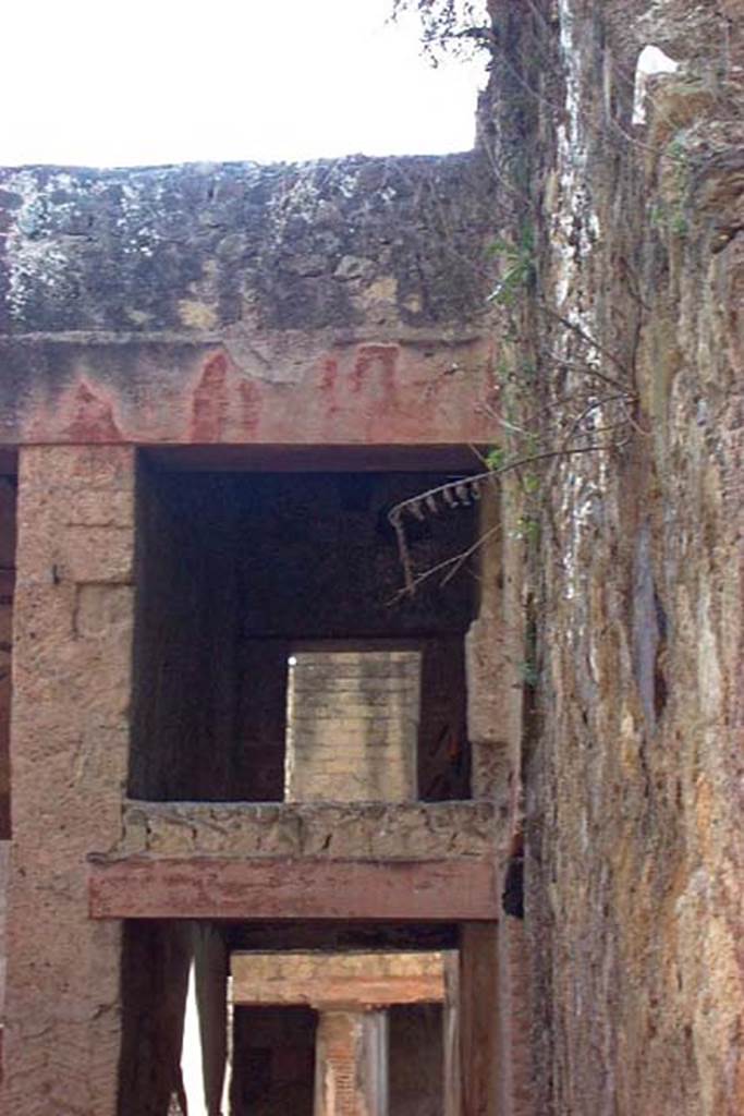 VI.17, Herculaneum. Not dated. Upper south wall at west end, of atrium. 
Photo courtesy of Nicolas Monteix.
