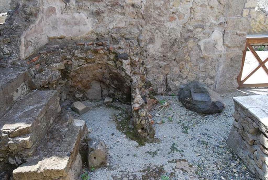 VII.4, Herculaneum, June 2008. Looking east towards north-east corner. Photo courtesy of Nicolas Monteix.
According to Monteix – “Maiuri mentions two large cylindrical furnace/hearths for large boilers which have disappeared. This description as well as the mention of a laundry in the “Vecchi Scavi” could imply the existence of a fleece/wool laundry in this space.”
See Monteix, N. 2010. Les lieux de metier. Boutiques et ateliers d’Herculanum. (p.407-8).
