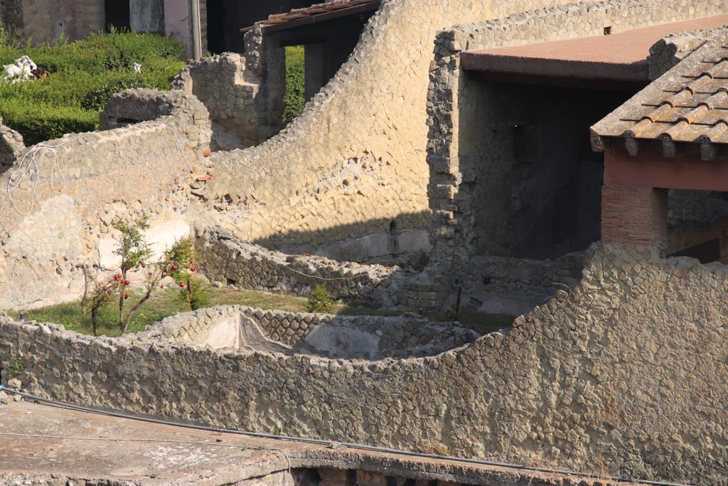 Ins. Or. I.1, Herculaneum. October 2023. 
Terrace on west end of south side, with room 8 in centre, looking north from access roadway. Photo courtesy of Klaus Heese.
