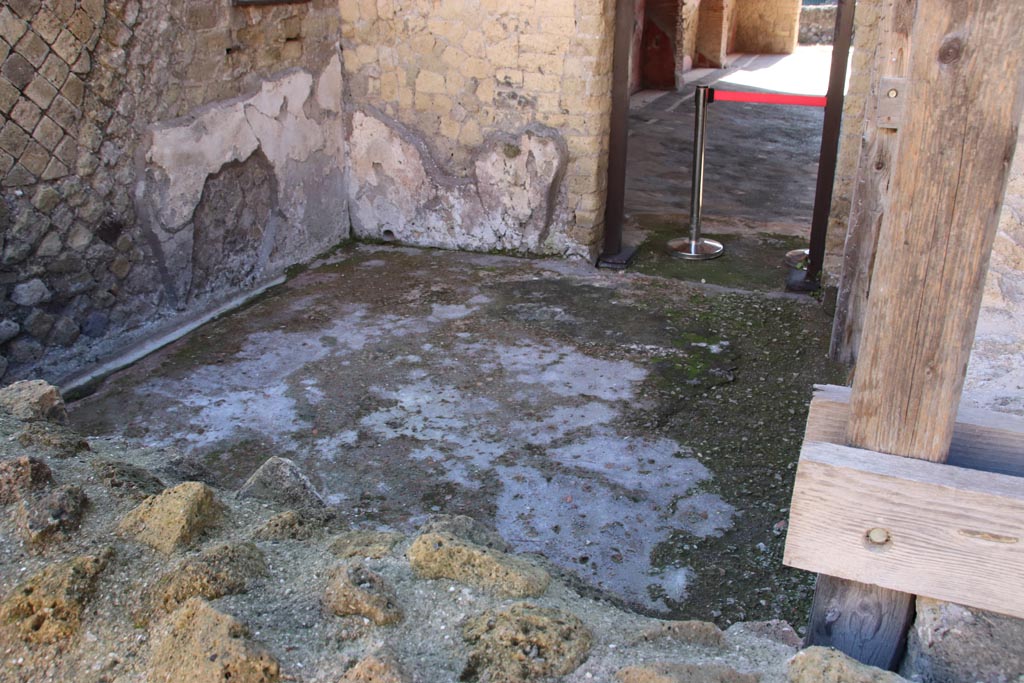 Ins. Orientalis I, 1, Herculaneum, October 2022. 
Looking north-east towards east wall of room with doorway to atrium. Photo courtesy of Klaus Heese.


