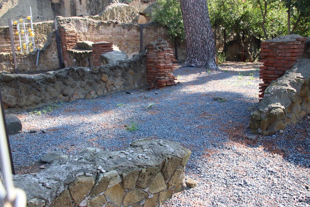 Ins. Orientalis I.3, Herculaneum, October 2022. Looking north-east towards area of room A, with doorway into room B, on right. 
In the upper right is a doorway to the garden area.  Photo courtesy of Klaus Heese.

