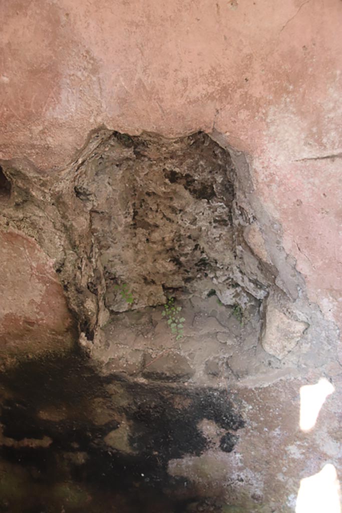 Ins. Or. II, 1a, Herculaneum. October 2023. 
Latrine c, detail, looking west through doorway. Photo courtesy of Klaus Heese.
