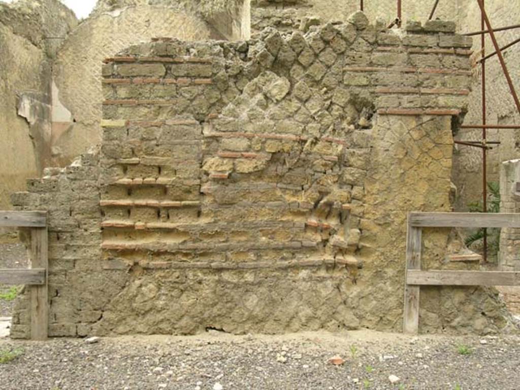 Ins. Orientalis II.4, Herculaneum, June 2005. 
Looking west across large terraced area to wall between two rooms on north side of entrance hall.
Photo courtesy of Nicolas Monteix.
