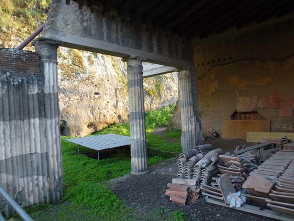 Ins. Orientalis II 4, Herculaneum, October 2012. Looking south-east across south end of west portico, towards the unexcavated.  Photo courtesy of Michael Binns.
